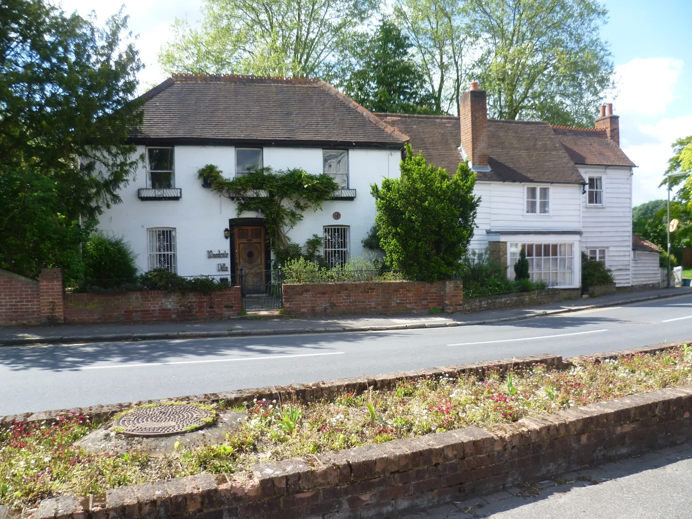 Older houses on Woodcote Road, Epsom. Every home in England is still banded on what it was worth on 1 April 1991