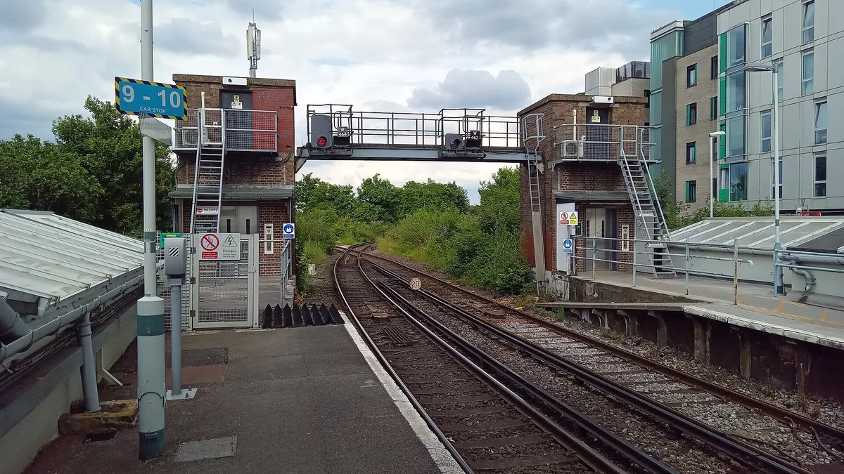 The junction at Epsom station. South Western Railway trains to Waterloo and Southern trains to Victoria and London Bridge share the four platforms