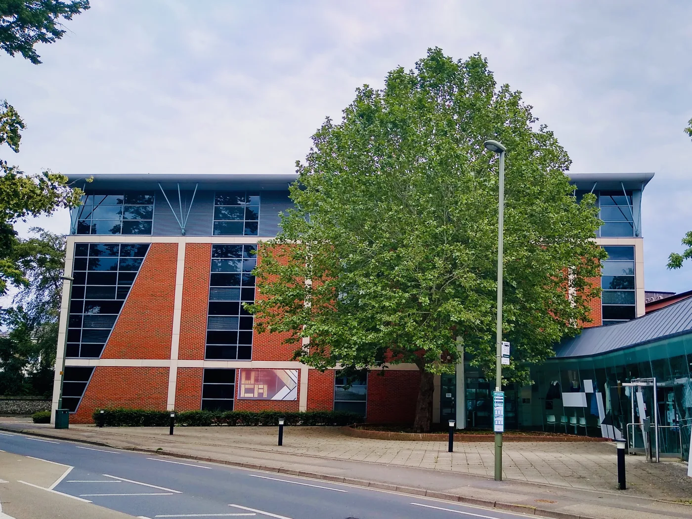 The University for the Creative Arts campus in Epsom. The officer report places the UCA campus to the south-east of the Swail House site and uses its scale as part of the justification for two four-storey blocks.